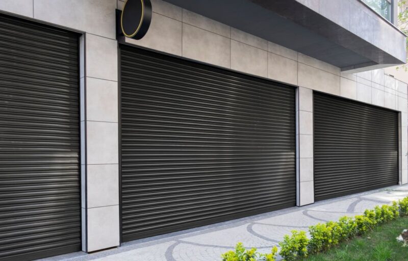 Closed Shop due to lockdown With Black metal roller shutter door